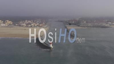 Drone View Of Capbreton In The Mist, The Boucarot Pass With Ocean Evaporation And The Lighthouses