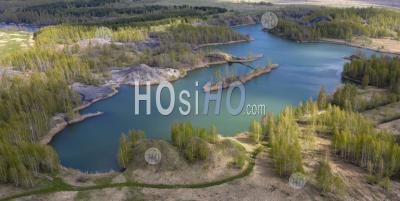 Aerial View Of An Abandoned Quarry, Forest And The Lake With Turquoise Water. - Aerial Photography