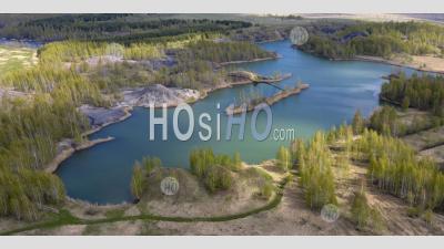 Aerial View Of An Abandoned Quarry, Forest And The Lake With Turquoise Water. - Aerial Photography