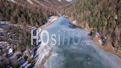 Frozen Lake Of Orceyrette, Hautes-Alpes, France - Video Drone Footage