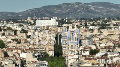 La Canebiere Avenue And Reformes Church From Vieux-Port, Marseille, Bouches-Du-Rhone, France - Video Drone Footage
