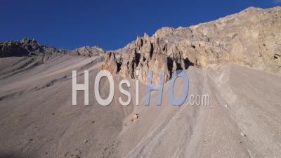 Ruiniform Reliefs In The Scree Of The Casse Deserte Near The Izoard Pass, France, Viewed From Drone