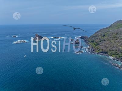 Wild Seascape And A Divers Boat At Blongas Bay, South Lombok, Indonesia - Aerial Photography