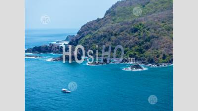 Wild Seascape And A Divers Boat At Blongas Bay, South Lombok, Indonesia - Aerial Photography