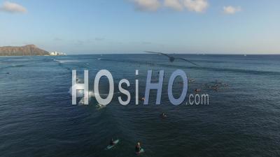 Surfers On Ocean, Waikiki, Honolulu, Hawaii - Video Drone Footage