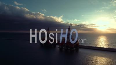 Oil Rig During Sunrise - Video Drone Footage